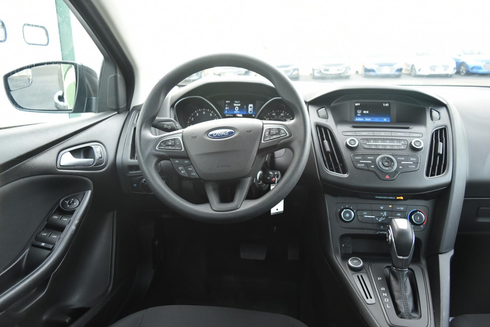 2016 Gray /Black Ford Focus SE (1FADP3F26GL) with an 2.0L I-4 GDI TI-VCT FLEX FUEL engine, 6-Speed Powershift Automatic transmission, located at 1600 E Hwy 44, Rapid City, SD, 57703, (605) 716-7878, 44.070232, -103.171410 - Photo#12